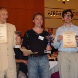 32 The Open Solving Tournament winners: 1st Dolf Wissmann (Netherlands, middle), 2nd Pauli Perkonoja (Finland, left), 3rd Noam Elkies (Israel, right)