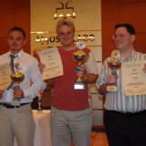 37 The 28th World Chess Solving Championship winners: 1st John Nunn (Great Britain, middle), 2nd Piotr Murdzia (Poland, left), 3rd Ram Soffer (Israel, right)