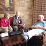 15 Ann Rice and Colin Sydenham talking with Byron Zappas at the hotel lobby